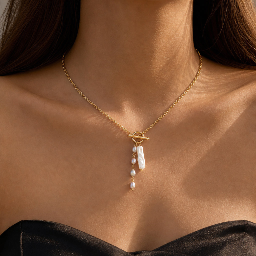 Woman wearing freshwater pearl toggle pendant necklace