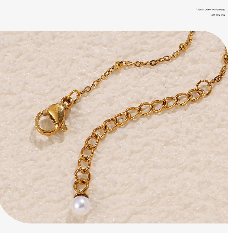 Cross-border French fashion simple clavicle chain peanut pearl necklace women's titanium steel plated 18k gold bowl bean pearl pendant