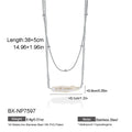 Silver-tone stainless steel necklace with elongated freshwater cultured pearl