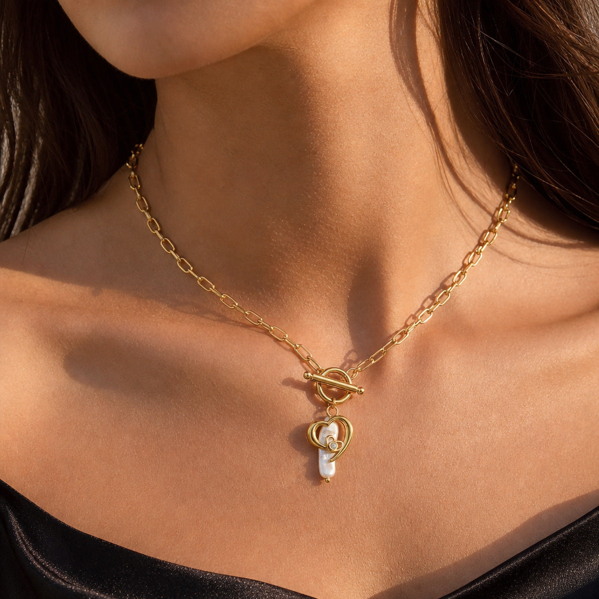 Woman wearing freshwater pearl toggle pendant necklace